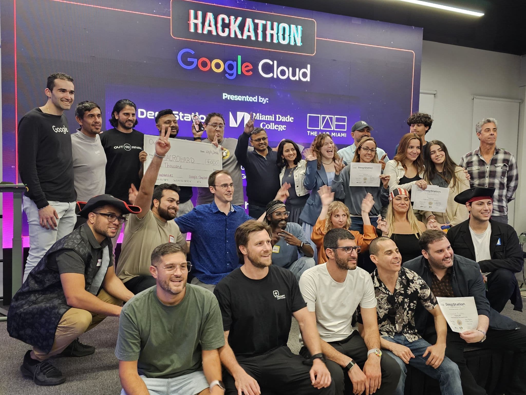 Group photo of hackathon winners and participants