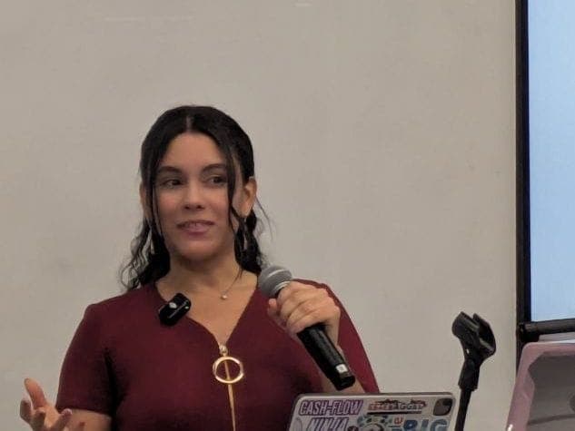 A speaker at the microphone during a talk