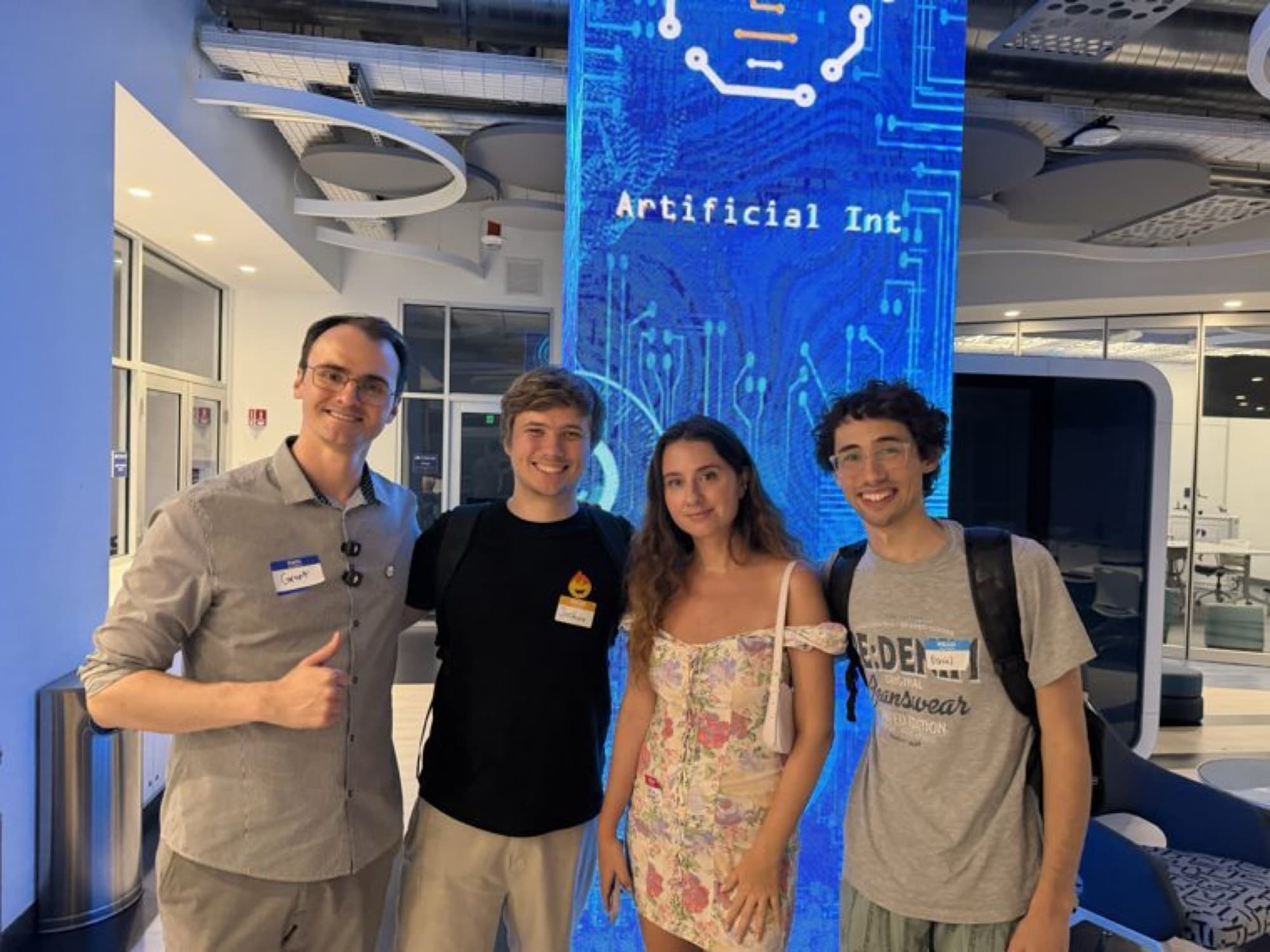 Four DeepStation members at the AI Demo Night